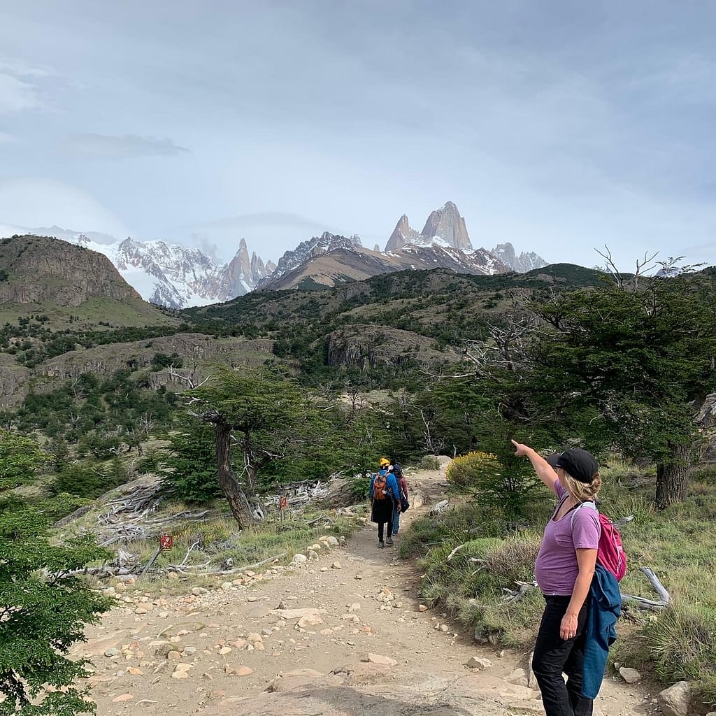 travelling after kids - pregnant woman hiking in patagonia