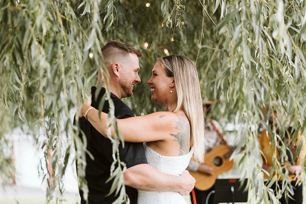 blog post our wedding story first dance under willow tree