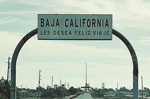 Baja California vs Baja California Sur What's the difference sign on road feliz viaje