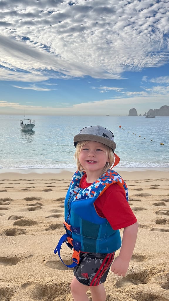 travelling after kids - toddler on beach in cabo on beach